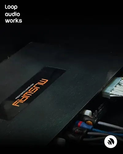 Amplifier and DSP mounted in a KIA install. Car audio installation by Loop Audio Works, Coimbatore.