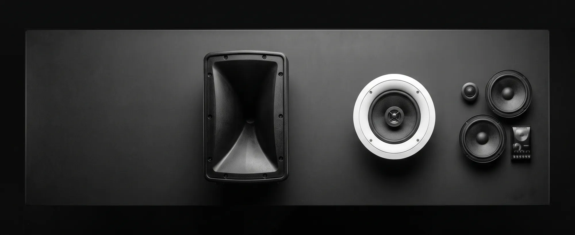 Audio installation services in Coimbatore, Bangalore and Chennai Audio installation services in Coimbatore, Bangalore and Chennai. Overhead flat-lay of a car component speaker, an in-ceiling driver and a commercial horn.